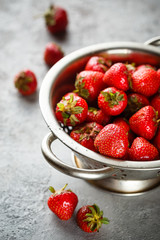 Ripe strawberry in colander