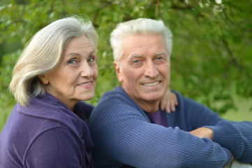 senior couple hugging 