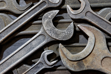 Obraz na płótnie Canvas Backgrounds and textures: assortment of old wrenches, industrial abstract