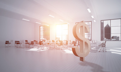 Money making and wealth concept presented by stone dollar symbol in office room