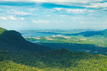 Naklejka premium View of blue sky, sea and mountain seen from Cable Car viewpoint, Langkawi, Malaysia. Picturesque landscape with tropical forest, beaches, small Islands in waters of Strait of Malacca