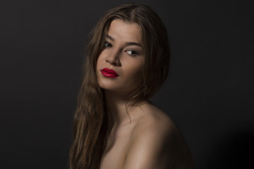Fototapeta premium Romantic young woman with naked shoulders