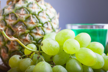 Close up of white grapes and pineapple