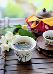 Healthy oolong tea cup with leaves