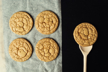 Biscuit sweet cookie background. Domestic stacked butter biscuit pattern concept,close up macro.Homemade cookies on wooden table.Cereal biscuits with the sesame,peanuts,sunflower and amaranth.