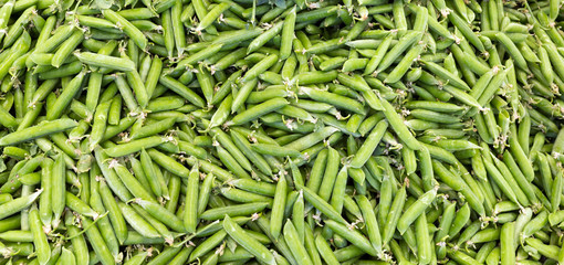 Fresh green peas, background