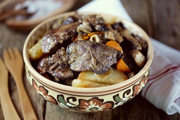 Chicken liver fried with potatoes, mushrooms, carrots, onions in olive oil. Rustic style. 