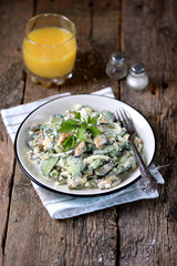 Salad with mussels, cucumber, boiled egg, green onions and dill with yogurt.