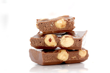 Chocolate with hazelnuts closeup