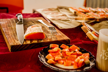 fresh salmon red fish on wooden board