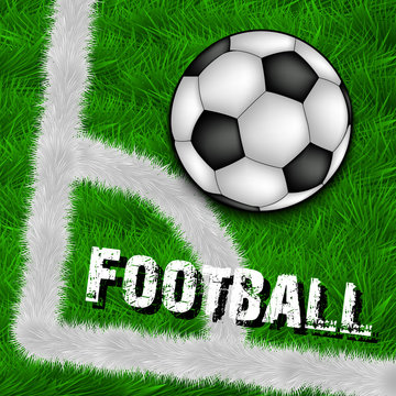 A soccer ball lies on the corner of a football field