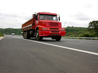 Fototapeta na wymiar red truck loaded