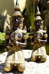 statues of praying monks
