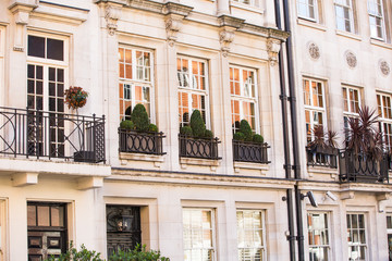 Windows of the luxury apartments in Mayfair. Centre London residential buildings.  