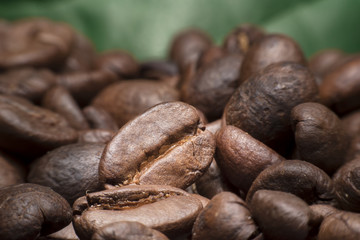 close up coffee bean green background