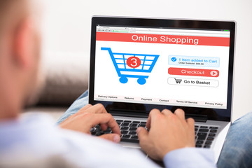 Close-up Of A Man Doing Online Shopping