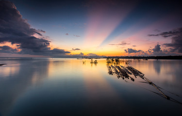 wonderful ray of sun during sunrise at buntal village