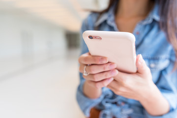 Woma using cellphone