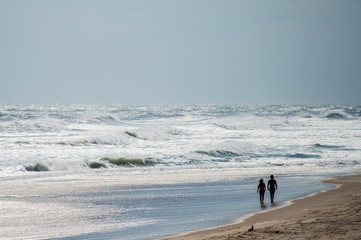 Couple walking on beach