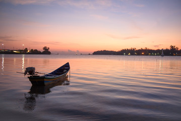 Fototapeta na wymiar Fishing boat in morning
