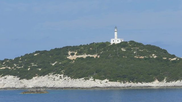 Greek lighthouse on an island.