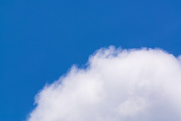 Deep blue sky and clouds.