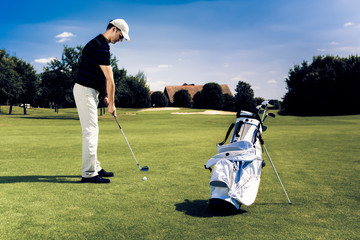 Obraz na płótnie Canvas Man Playing Golf