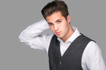 Overly confident male teenage millennial model posing with boosted ego, conceited, vain, arrogant 