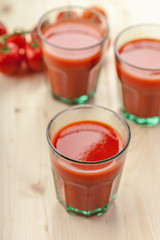 Tomato juice and fresh tomatoes