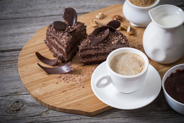 Chocolate cake on old wooden table
