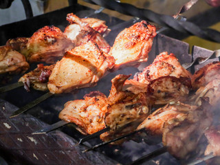 Skewers of chicken. Poultry meat cooked on the coals.