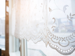 Lace curtain Window frame with morning light Vintage Home interior decoration