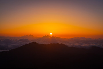 Incredible sunset over mountains. Haleakala Sunrise, Maui