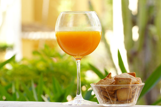 Glass of natural orange juice for the healthy breakfast in vacation
