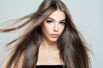 Woman with Long Healthy Hairstyle. Beautiful Model with Brown Hair and Cute Face. Beauty Salon...