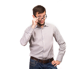 Young jocular man portrait of a confident businessman on a gray background. Ideal for banners,...