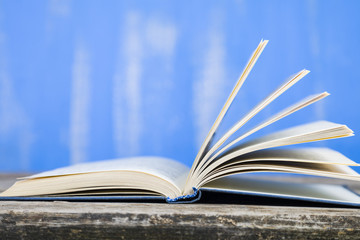 Open book on a wooden table
