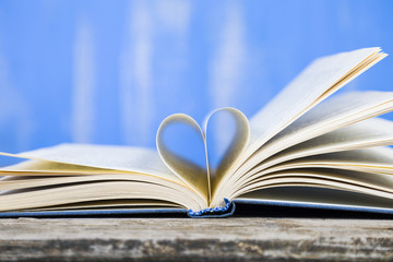 Open book on a wooden table