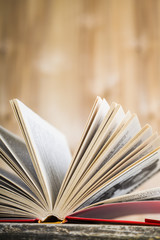 Open book on a wooden table