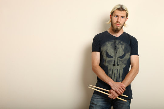 drummer with drumsticks