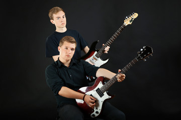 guys with electric guitars