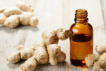 Ginger essential oil in the amber bottle