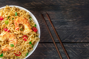 Instant noodles with vegetables, shrimps, and copy space