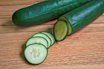 Closeup of cucumbers on a wooden table