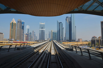 Fototapeta na wymiar Dubai, UAE, March 2014: The view to Dubai city from metro sky line. 
