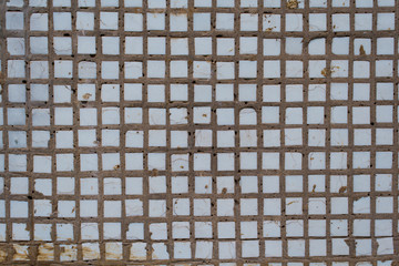 Wall of small tiles background