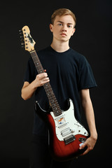 Obraz premium guy with an electric guitar