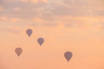 Fototapeta premium Hot Air Balloon with Dramatic Sky in Morning