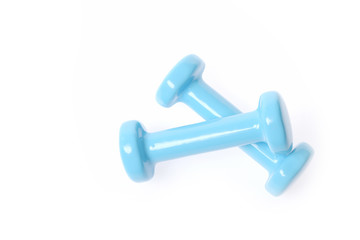 Pair of light blue dumbbells isolated on white background