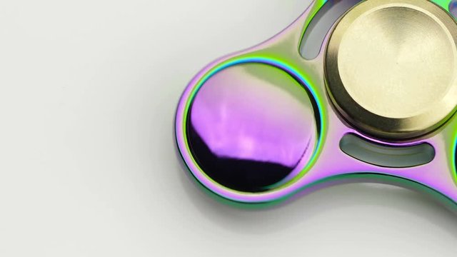 Toy fidget spinner on a white background.
